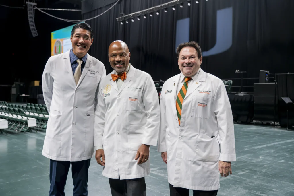 From left, Christopher Chen, M.D. ’00; Henri R. Ford, M.D., M.H.A., dean and chief academic officer of the Miller School; and Edward Dauer, M.D. ’75 From left, Christopher Chen, M.D. ’00; Henri R. Ford, M.D., M.H.A., dean and chief academic officer of the Miller School; and Edward Dauer, M.D. ’75