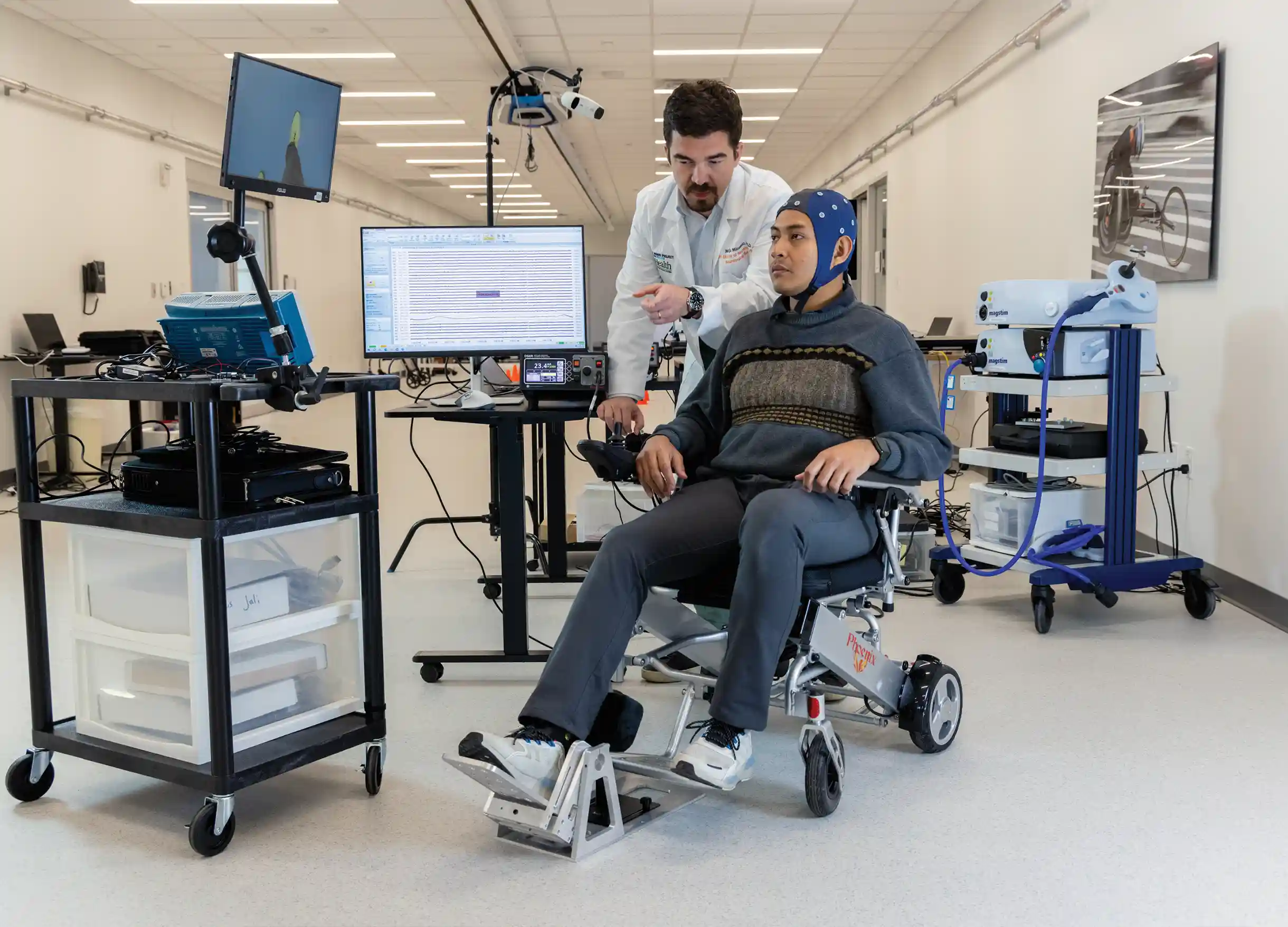 A patient and researcher working to help regain mobility