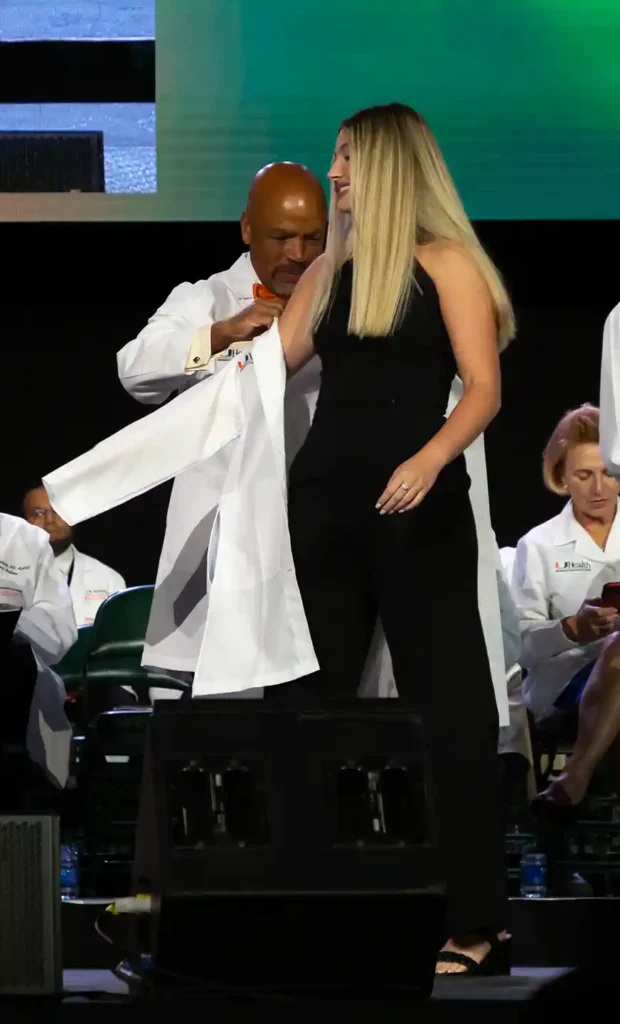 medical student receives white coat