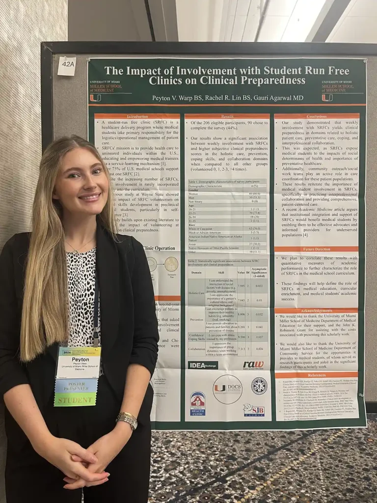 medical student shows off her research artboard